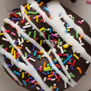 Picture of Chocolate Icing with Rainbow Sprinkles & Vanilla Drizzle